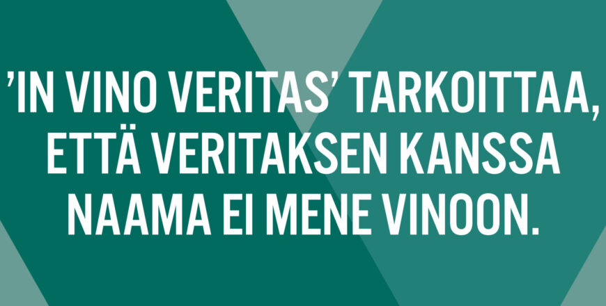 Veritaksen banneri, jossa lukee "In vino veritas' tarkoittaa, että Veritaksen kanssa naama ei mene vinoon."